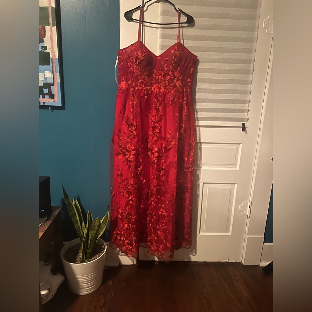 Red Floral applique ballgown with illusion corset